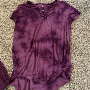 American eagle T-shirt with criss cross on chest